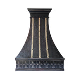heavy hammered dark curved copper range hood with fleur apron front view