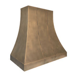 slope view of traditional brass kitchen range hood with curved silhouette