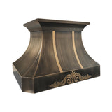 refined curved antique brass range hood with symmetrical polished brass vertical inlay strips and ornate embossed scroll floral detailing for vintage farmhouse luxury kitchen