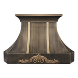 refined curved antique brass custom range hood with symmetrical polished brass vertical inlay strips and ornate embossed scroll floral detailing for vintage farmhouse luxury kitchen