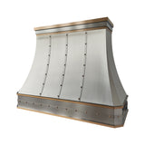 brushed stainless steel kitchen range hood with decorative crown molding and straps  slope view