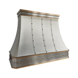 brushed stainless steel kitchen range hood with decorative crown molding and straps slope view