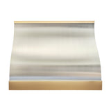 elegant barrel shape brushed stainless steel wall chimney range hood with polished brass top and bottom trim for transitional kitchen design front view