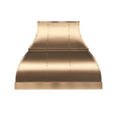 bell shaped brass range hood with straps and small round rivets for luxury kitchen design front view
