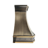 refined curved premium brass wall chimney range hood with vertical polished brass inlays, trim and decorative rivets for transitional industrial kitchen design side view