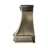 refined curved premium brass wall chimney range hood with vertical polished brass inlays, trim and decorative rivets for transitional industrial kitchen design side view