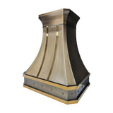 refined curved premium brass wall chimney range hood with vertical polished brass inlays, trim and decorative rivets for transitional industrial kitchen design