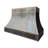 curved antique zinc custom range hood with antique brass grid trim and decorative rivets right side view