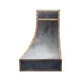 curved antique zinc custom range hood with antique brass grid trim and decorative rivets side view