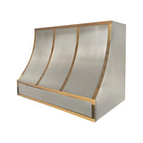 geometric designed structured stainless steel stove hood with brass accents for farmhouse kitchen design slope view