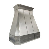 brushed stainless steel range hood with decorative molding and polished rivets slope view