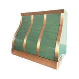 custom curved range hood with polished brass trim and vertical straps, side view