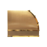 barrel shaped brass kitchen range hood with brass straps and rivets for luxury kitchen 
