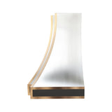 close-up view of stainless steel range hood with curved brass-trimmed edges