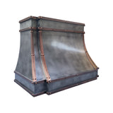 modern zinc range hood with copper straps and rivets