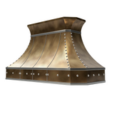 antique brass vent hood with curved crown and large round rivets