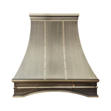 brass range hood with brushed finish and pot rail