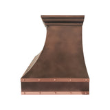 copper range hood with sleek curved design and decorative straps and rivets side view