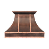 copper range hood with sleek curved design and decorative straps and rivets for farmhouse front view