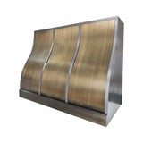 brushed brass stove hood with sleek and symmetric flow 